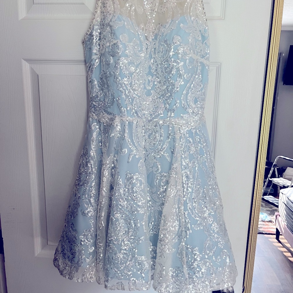 Homecoming dress, baby blue with silver overlay.